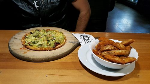 GF and vegan Damned with a side of Cajun wedges at Hell Pizza in Queenstown
