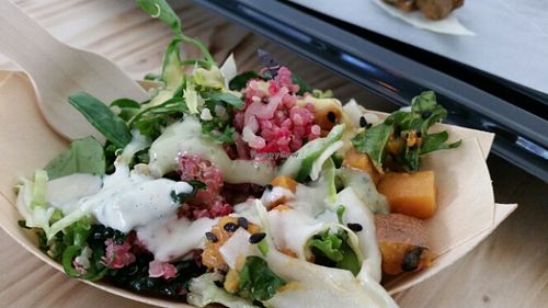 salad with dressing  at Souls in Copenhagen