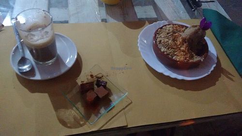 Our dessert: Barranuito (a liquor coffee popular in Tenerife), chocolate truffles and fresh apple and peach crumble with banana ice cream. All vegan, all delicious! at Fuori di Zucca in Tenerife