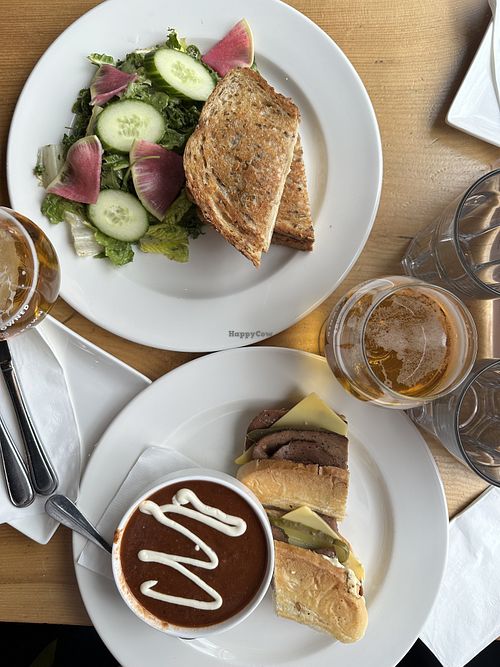 Turkey cranberry panini with garden salad; Cuban sandwich with black bean soup (soup of the day).   at Plant Matter Kitchen in London