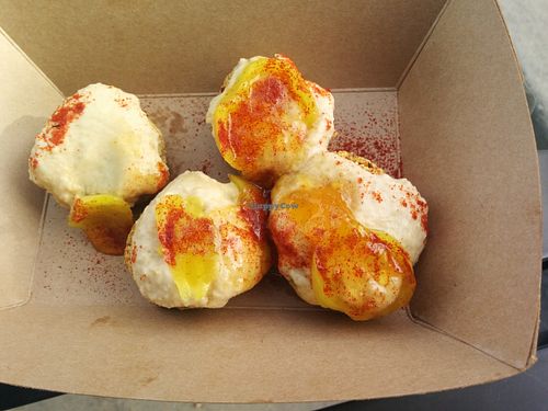 Amazeballs! Baked quinoa patties topped with garlic hummus, banana peppers, mango chutney, smoked paprika. Yes, amazingly tasty... at Falacos - Food Truck in Houston