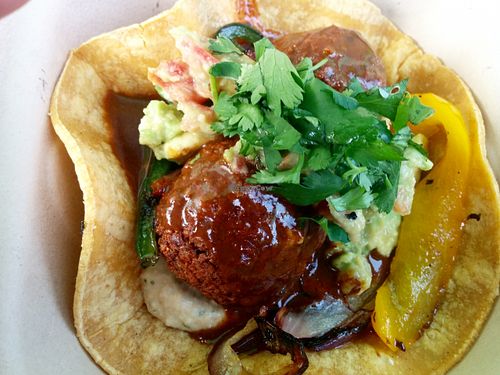Down South: cilantro lime hummus, falafel balls, spicy enchilada sauce, peppers/onions, spicy guacamole on corn tortilla. 
Get thee in my mouth! Excellent eating hot, and just as good cold - great travel food. at Falacos - Food Truck in Houston