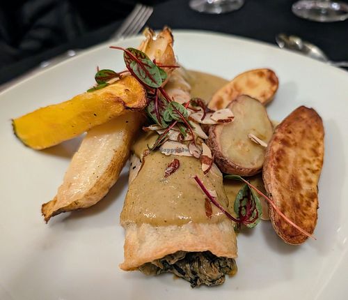 Crepe filled with trumpet mushrooms, caramelized onions, and spinach at Harvest Beat in Seattle