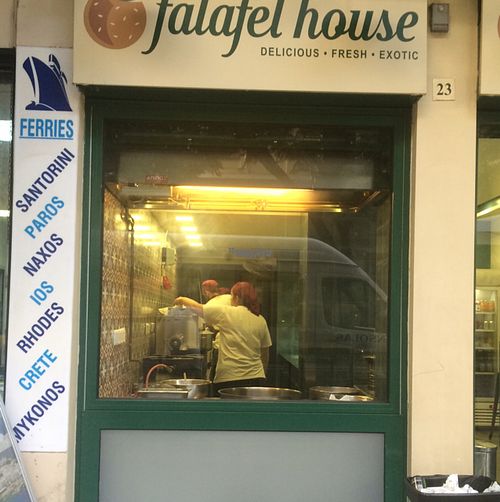 front of shop at Falafel House in Athens
