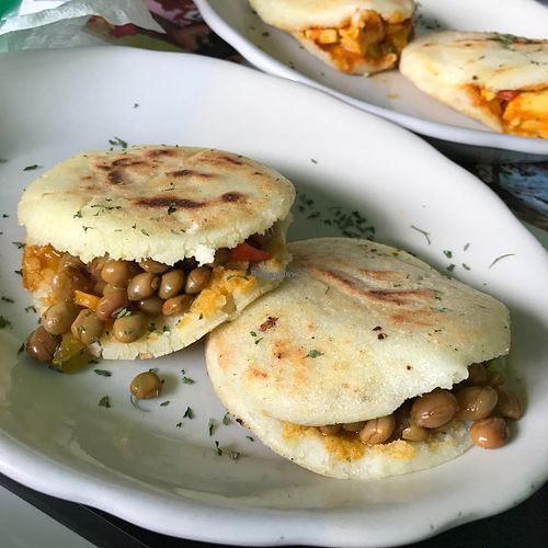 Arepas with green pigeon peas (front) and tofu (back)-so good... at La Morena Bar and Restaurant in Lares