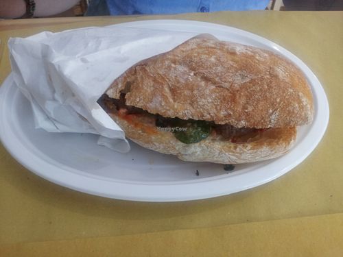 Yummy vegan burger with grilled vegetables and tomato sauce. at Loma in Modena