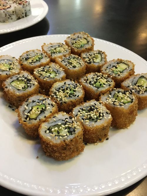 Maki of avocado, deep fried tofu, fired on the outside at HuaSheng in Lisbon