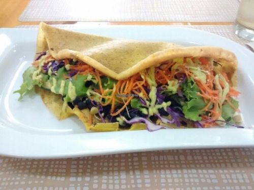 Taco integral relleno de frijoles negros y vegetales at The Plant Based Factory in Miraflores