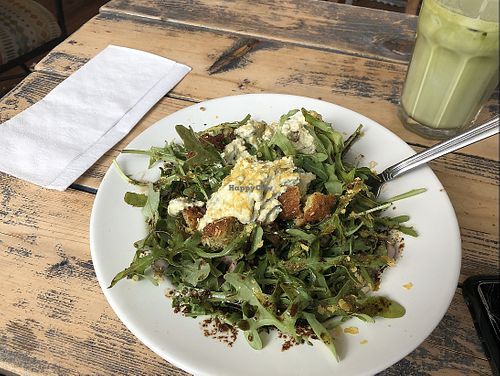 Salad and green drink   at The Karma Conscious Cafe and Eatery in Saskatoon