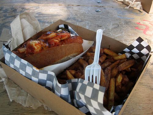 K-Pop hot dog with kimchi, bbq sauce and black sesame seeds at Dirty Pizza in Montreal