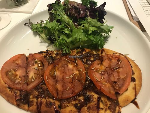 Vegan flatbread - carmelized onion with tomato. at Vini Culture in Frederick