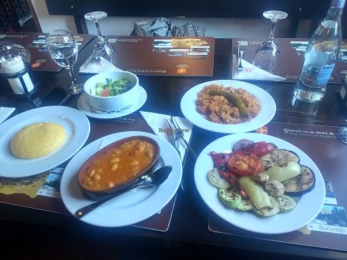 Polenta, bean stew, cabbage, cucumber salad, vegetables at Taverna Sarbului in Sinaia