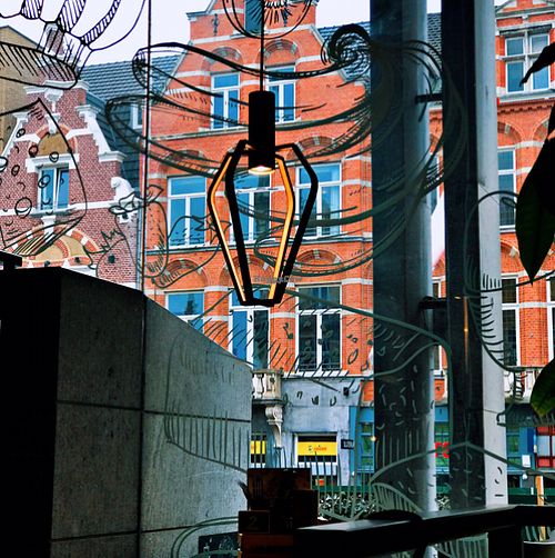 View from the inside looking out at SAP Bagel & Juice Bar - Stationsstraat in Maastricht