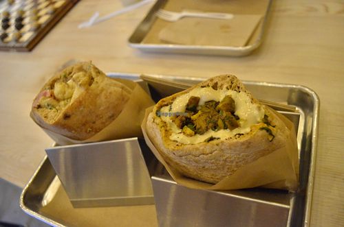 Mushroom pita, Cauliflower pita (back) at Shouk in Washington