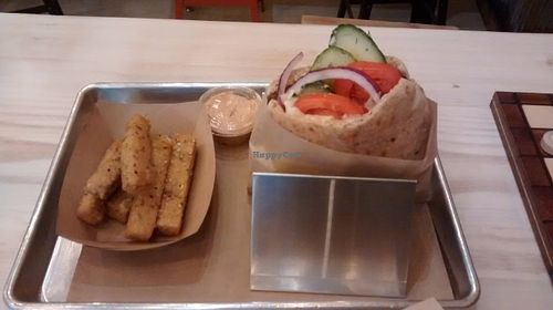 Cucumber-hummus pita and polenta fries at Shouk in Washington
