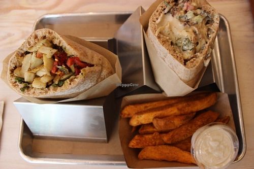 Cauliflower pita, Fennel pita, Sweet potato fries and cashew labneh at Shouk in Washington