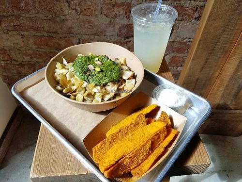 fennel bowl with sweet potato fries and lavender lemonade at Shouk in Washington