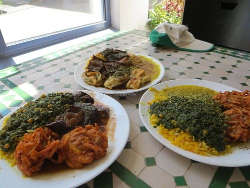 Table full of vegan dishes at Afghan-Eck in Freiburg