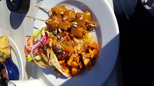 Tofusatay, Couscous, sweet baked potatoes, baked tomatoes, and a salad on the side. It was great, and delicious!  at De Kluis in Venlo