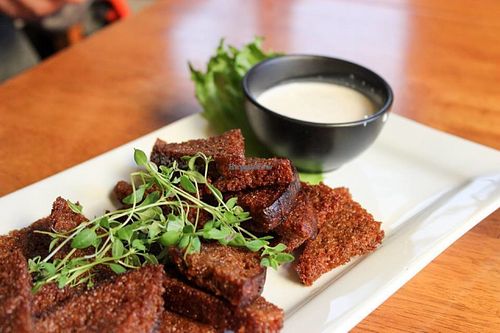 fried dark bread with vegan garlic dressing at Punkt 13:15 in Parnu