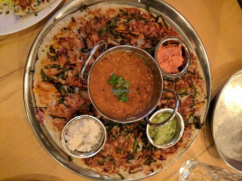 Uttapam - pancake bread sort of dish full of vegetables at Dosa Bar in Tel Aviv