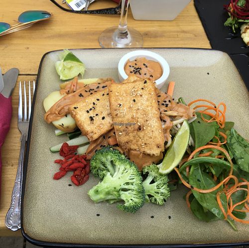 Gado Gado with crispy tofu and spicy peanut sauce. with raw vegetables and potatoes.  at Amala Conscious Food in Bournemouth