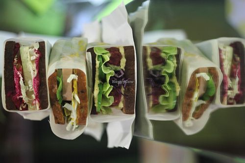 Tofu sandwich with beetroot hummus, rucola and mustard sauce (vegetarian)         
Sandwich with seitan sausage, spinach and cucumber  (vegetarian)                            
 at Ra.man in Kyiv