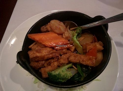 sizzling veggies and tofu ! has oyster sauce or  some other animal product in the sauce !!! at Asian Garden in Grass Valley