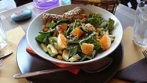 delicious salad with lettuce, corn,oranges, arugula, avocado, sesame and sunflower seeds  at ONO in Rhodes