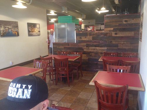 inside seating (there's more around the corner) at Rovente Pizzeria - Downtown in Portland