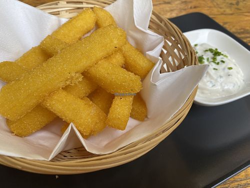 Polenta fries with their really yummy garlic dip! So good   at La Stella Nera in Berlin