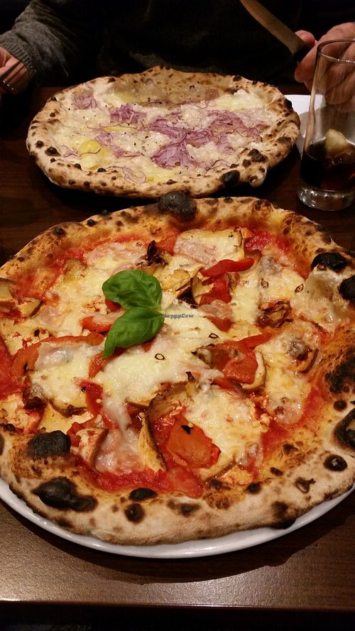 Stella Nera and vegan cheese in front, patata e cipolle in back at La Stella Nera in Berlin