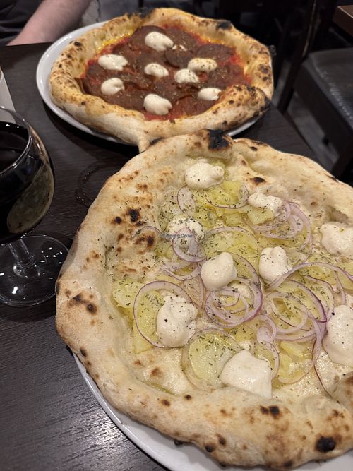 White potato pizza and a seitan-based pizza diavola.  at La Stella Nera in Berlin