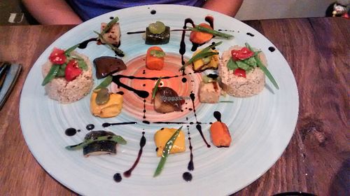 Candied vegetables in olive oil, bulgur, fava bean pâté and balsamic reduction at Sense Eat in Paris