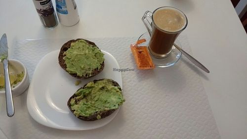 Coffee with coconut&rice milk and Avocado and lime on carrob bread. at Veganeats Caffe in Lisbon