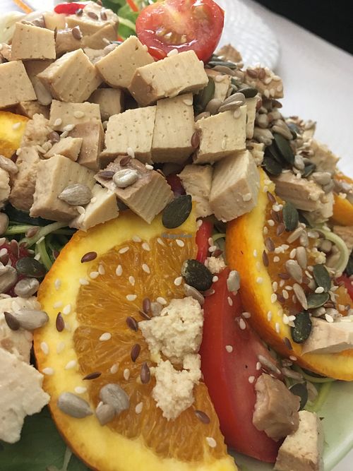 Smoked tofu salad with lots of fruit and seeds at Veganeats Caffe in Lisbon