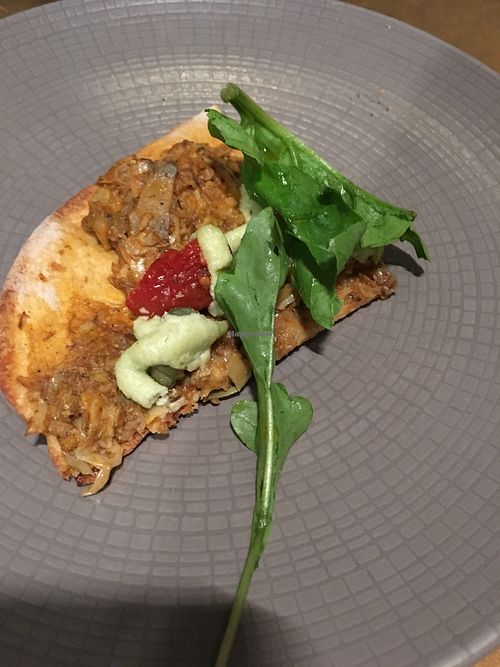 A piece of the pizzeta starter at Farmacy in West London