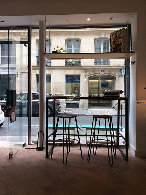 Seating for those having a bite to eat at 1944 Gallery Vegan Shop in Paris