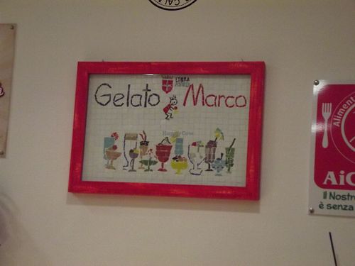 Cute mosaic with their logo. at Gelato Marco in Trieste