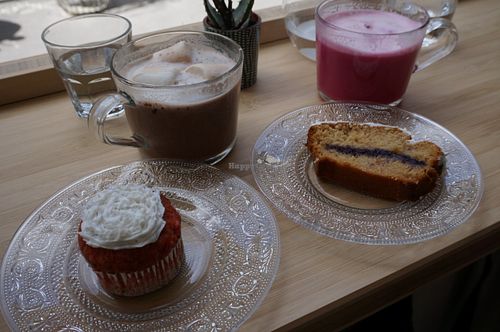 Banana cupcakes with vanilla frosting and Pound cake with blueberries.  at Oatmeal in Paris