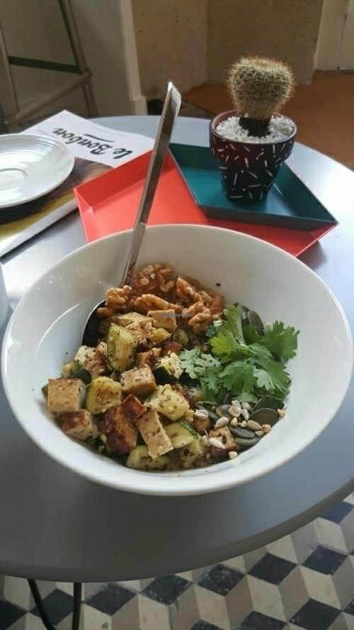 Oatmeal with smoked tofu, zucchini, pumpkin seeds, walnuts, coriander and olive oil   at Oatmeal in Paris