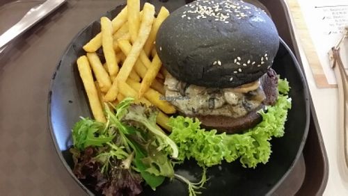 Swiss mushroom charcoal burger  at GroVe in Central Singapore