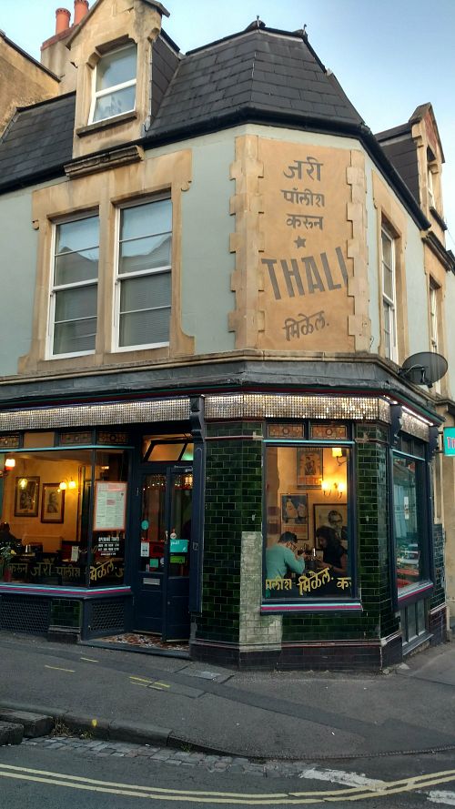 It says in Hindi - we will polish your sliver here at Thali Cafe - Montpelier in Bristol