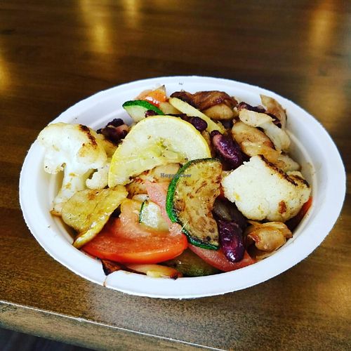 Bowl with quinoa or potatoes, zucchini, cauliflower, three beans, tomato and onion  at Cafe Uovo in Camp Hill