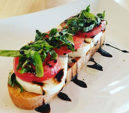 Vegetarian brustini. A bruschetta-like creation. They have 5-6 different choices to choose from. Bonus, the bread is ciabatta so they can make vegan versions of these.  at Cafe Uovo in Camp Hill