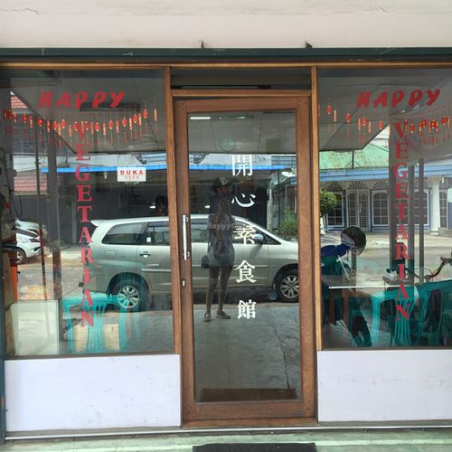 outside at Happy Vegetarian in 