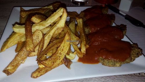 soutzoukakia (like vegan meatballs with tomato sauce) with lentils  at Trivoli Vegan Kafeneio in Athens