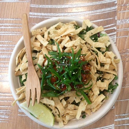 Spicy Thai apricot tempeh quinoa, almonds, edamame, scallion, crispy wontons with peanut dressing at By Chloe in Los Angeles