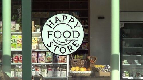 logo at Happy Food Store in Schoten
