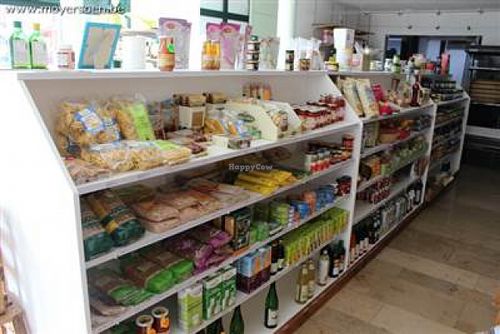 inside the store at Happy Food Store in Schoten